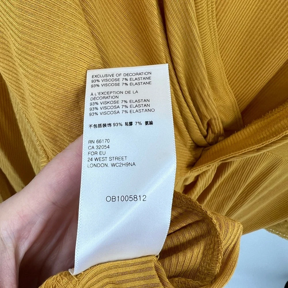 Free people Shimmy Shake yellow open twist back top